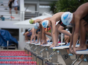 How Waterproof Swim Headphones Help Young Swimmers Train with Music and Coaching