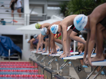 How Waterproof Swim Headphones Help Young Swimmers Train with Music and Coaching