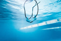 The Evolution of Swimming Technology: From Pace Clocks to Audio Coaching