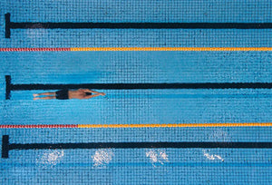 Why Swimmers Perform Better With Audio & Rhythm