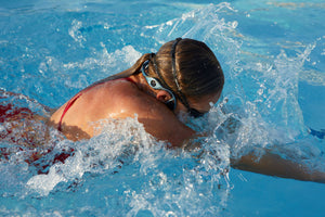Best Headphones for Lap Swimming (And Why Regular Waterproof Isn’t Enough)
