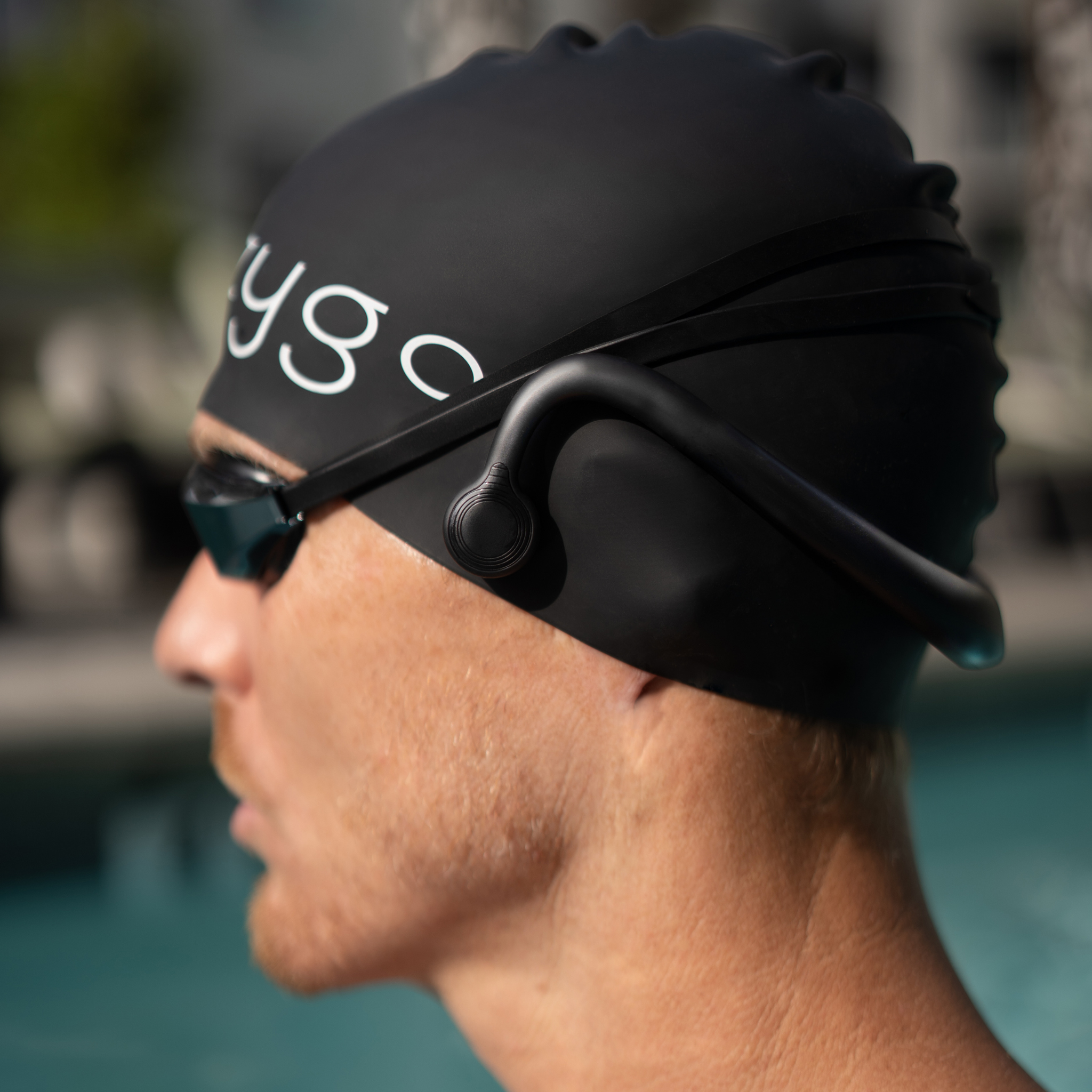 Zygo Z2 bone conduction swimming headphones being used in the pool